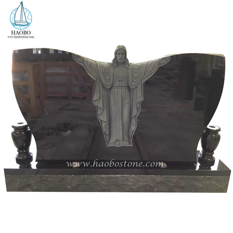 Lápida funeraria tallada Jesús en forma de mariposa de granito negro
