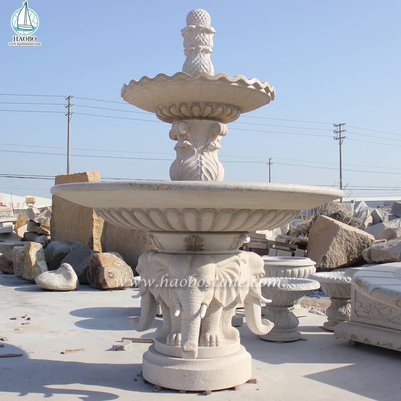 Fuente de rueda de agua de mármol Decoratin de jardín con talla de elefante
