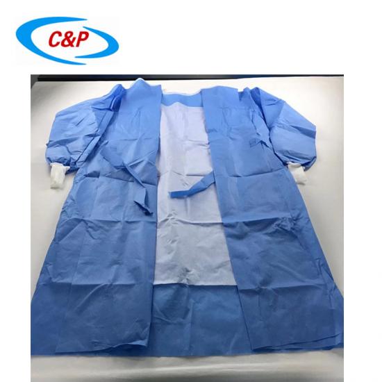 Proveedores de batas quirúrgicas reforzadas azules no tejidas estériles desechables de venta caliente
