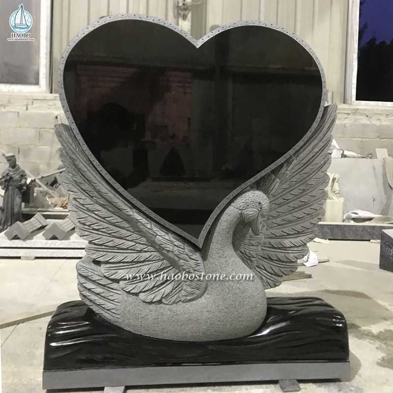 Lápida funeraria tallada en forma de corazón de cisne de granito negro
