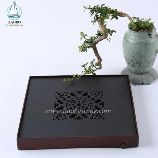 Bandeja de té de piedra cuadrada de talla hueca de diseño de China de granito negro
